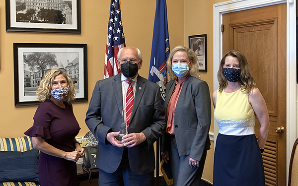 Rep. Tonko (center left) receiving the 2020 Humane Legislator of the Year Award, with Kitty Block (left), Sara Amundson (center right) and Tracie Letterman (right). The HSUS