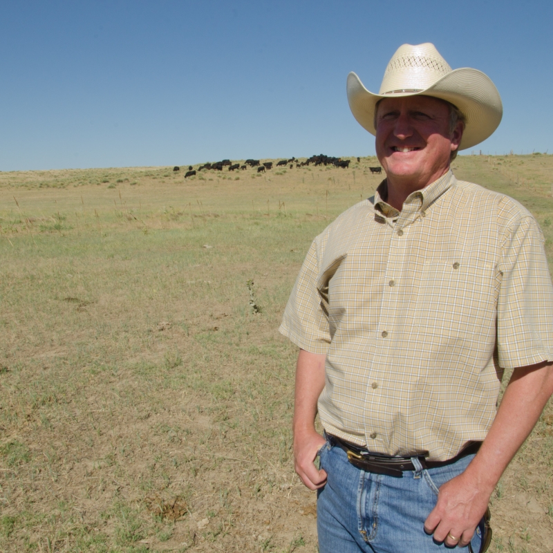 Man in cowboy hat.